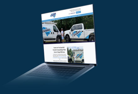 Carolina gutter website homepage displayed on a laptop mockup