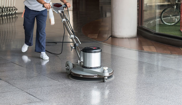 Commercial building floor cleaning with equipment