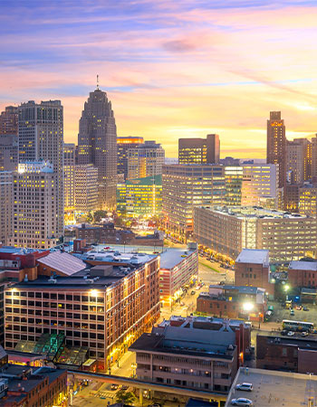 Detroit skyline with downtown buildings at sunset