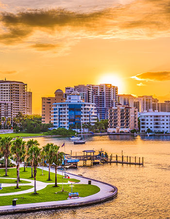 Sarasota skyline with waterfront and buildings at sunset