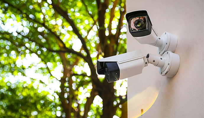 Two security camera installed on wall